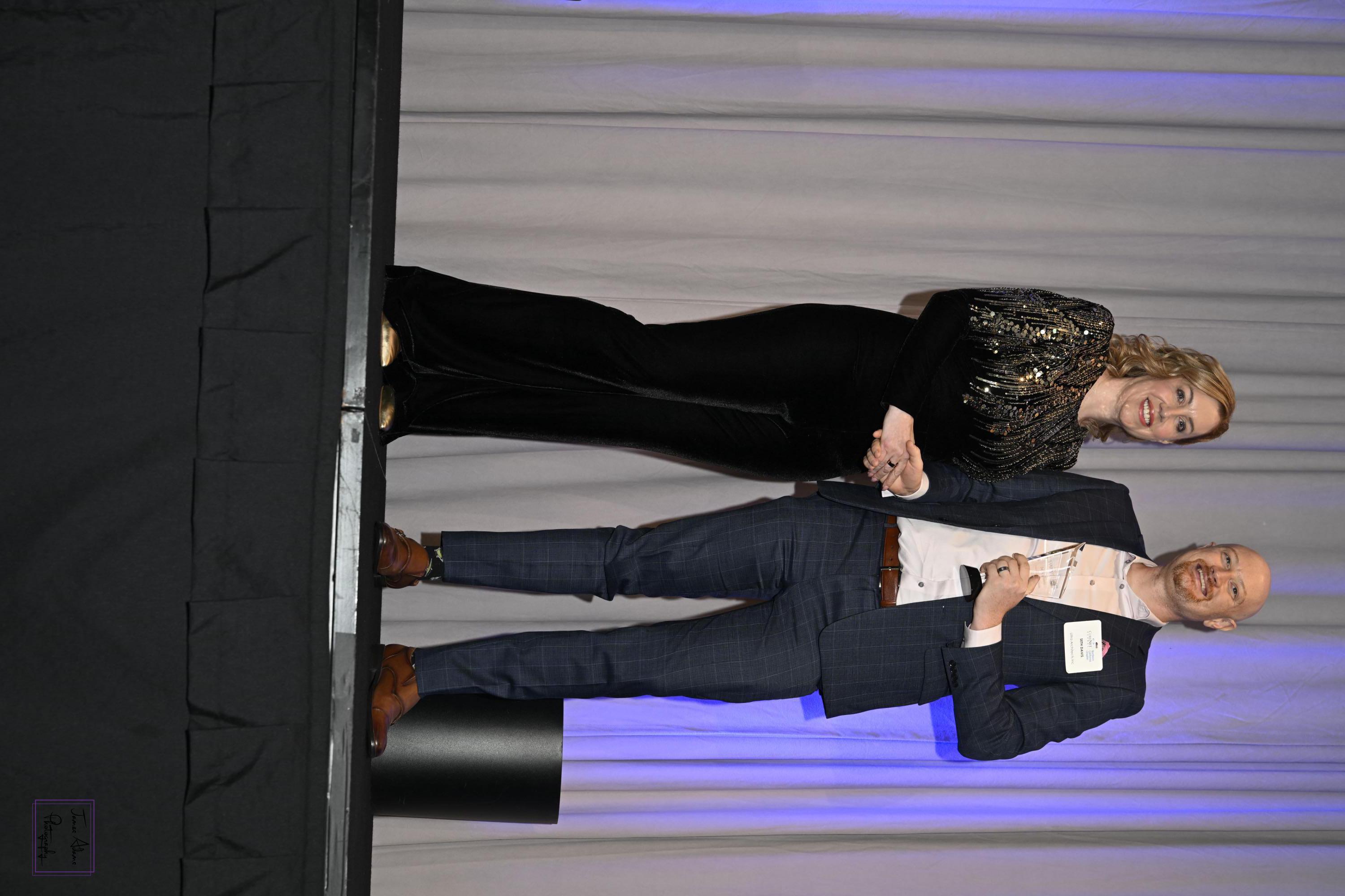 Seth Davis receiving the 2025 CoreNet Northern California Emerging Leader of the Year award